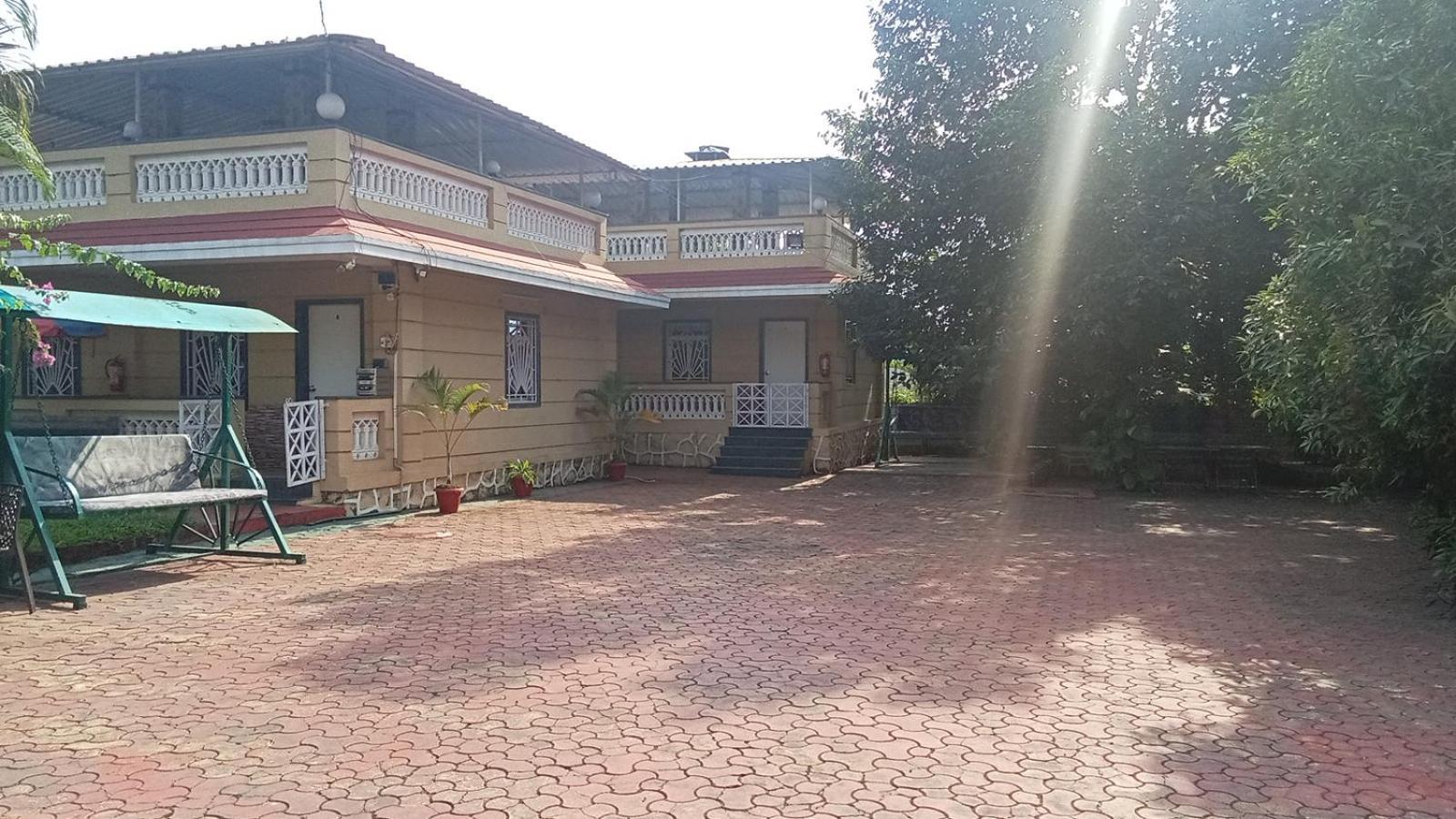 Giriraj Garden Resort Vagholi  ภายนอก รูปภาพ